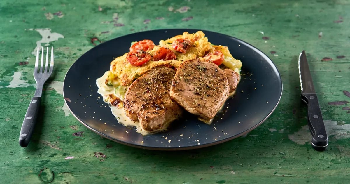 Varkensfilet met gratin van courgette en kerstomaatjes